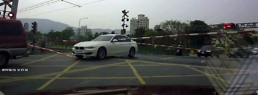 BMW 3 Series Nearly Gets Annihilated by a Train